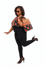 Adesuwa bag editorial shoulder-carry photograph with proportional fingers