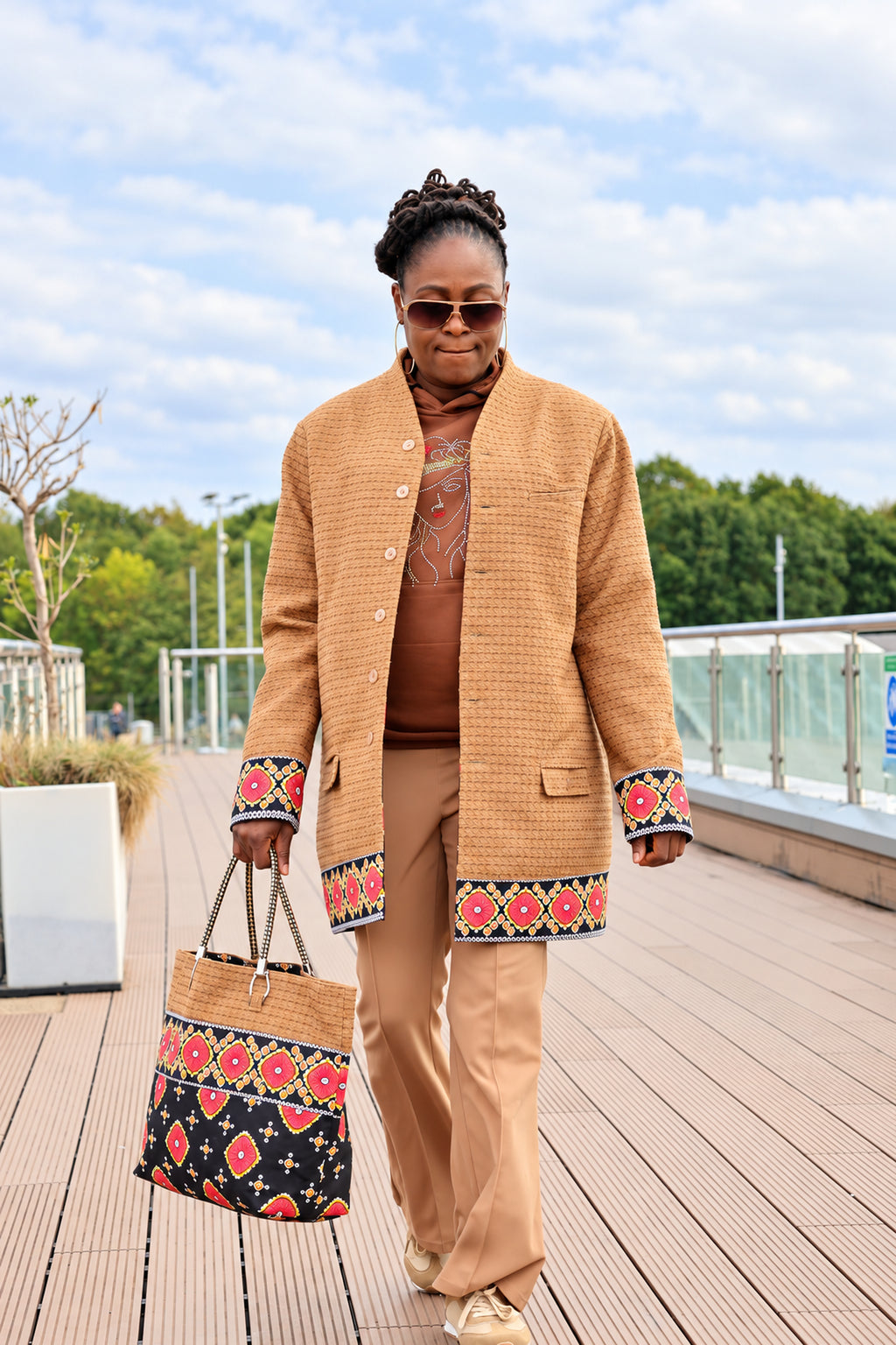 Adesuwa bag editorial photograph 2, balanced lighting and detailed Ankara fabric