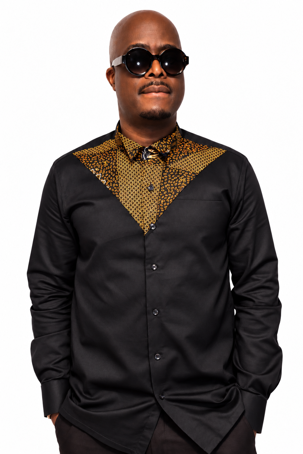 Akin black chino shirt with gold and navy Ankara V-shaped panel, front view on white background.